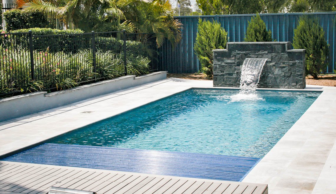 Northern Colorado Pools creates a relaxing, easy-care backyard space great for families to enjoy and unwind together.