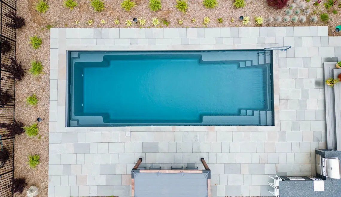 A modern pool designed by Northern Colorado Pools, showing quality work and style in Mead, Colorado.