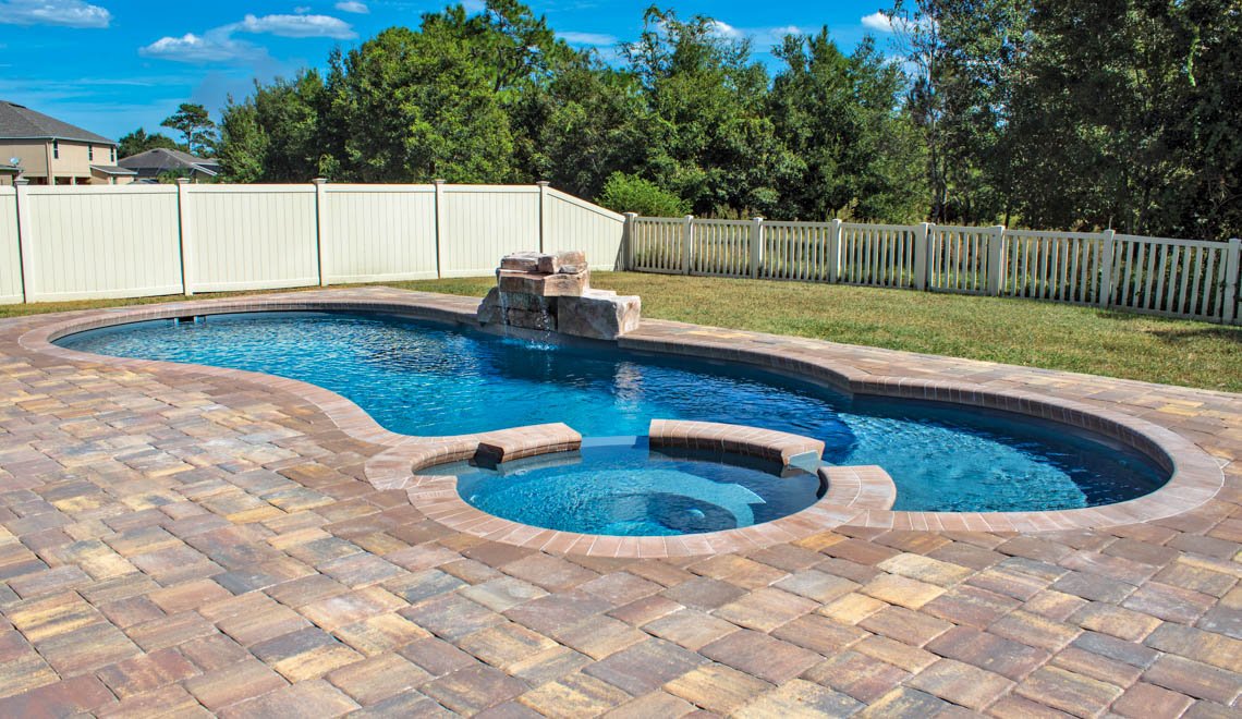Northern Colorado Pools shows a well-designed backyard pool area that highlights quality work and attention to detail.
