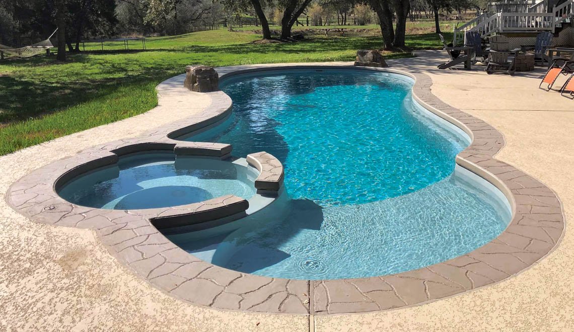 Northern Colorado Pools shows a relaxing backyard pool that’s great for families and highlights quality work and comfort.