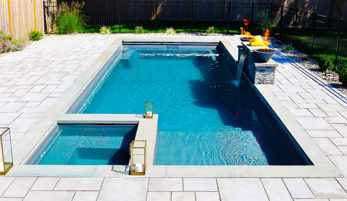 Northern Colorado Pools shows a stylish backyard pool perfect for relaxing or entertaining friends and family.