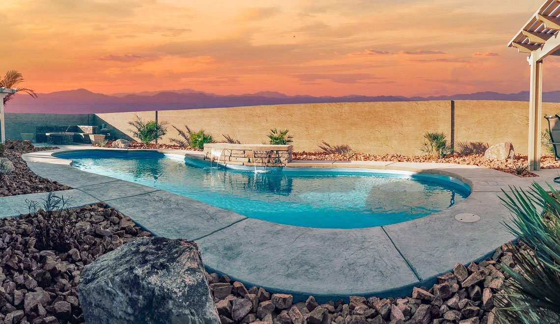 Northern Colorado Pools brings a relaxing, modern backyard swimming pool perfect for outdoor fun and enjoying sunset views.